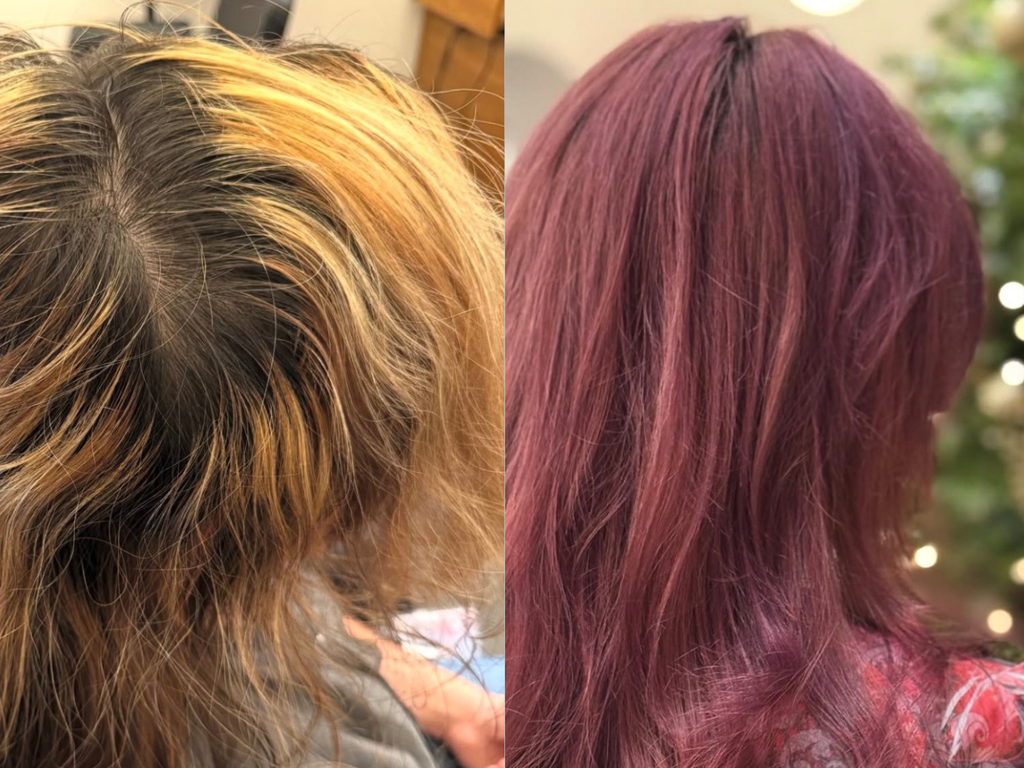 A side-by-side comparison of a person's hair, showing a dark brown root with blonde highlights on the left, and the resulting long, wavy, deep auburn/plum hair on the right against a blurred Christmas tree background.