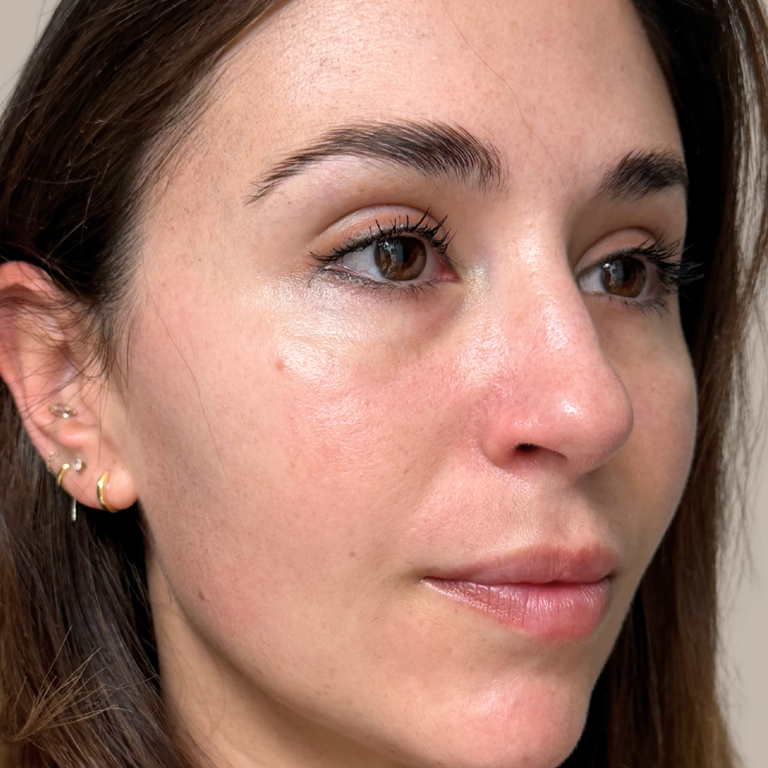 Close-up of a woman's face with a focus on her eye area.