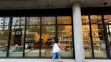 A storefront window with the words 