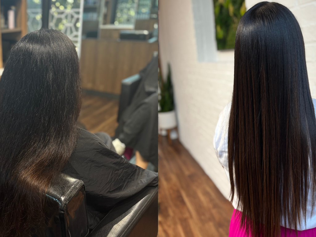 A side-by-side comparison showing a person from behind with very long, straight, dark brown to black hair. The left panel shows the hair in a salon setting, while the right panel shows it styled and glossy in an indoor room with a white brick wall.