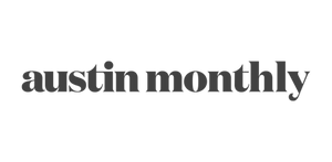 The text 'austin monthly' appears in a dark gray serif typeface on a plain white background.