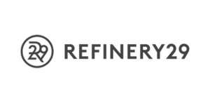 The logo for REFINERY29, featuring a circular emblem with the numbers '29' inside a circle on the left, next to the brand name 'REFINERY29' in a clean, sans-serif font, all in dark gray on a solid white background.