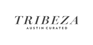 The logo for Tribeza Austin Curated, featuring the word 'TRIBEZA' in a large serif font with 'AUSTIN CURATED' underneath in a smaller sans-serif font, both in dark gray on a solid white background.